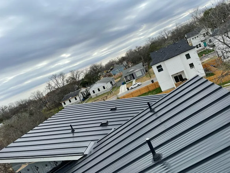 Standing seam metal roof panels with vents for Skylight Repair in Queensbury